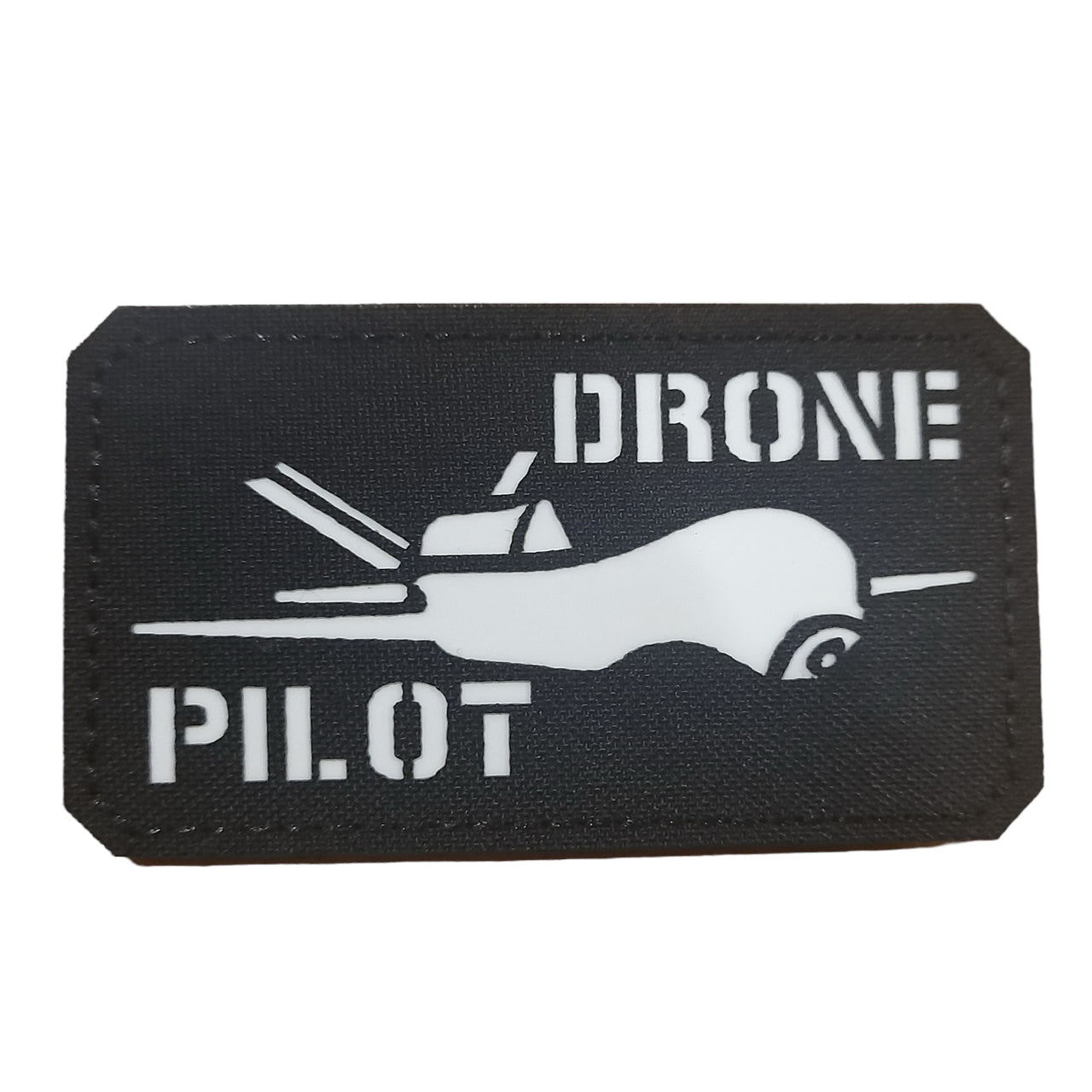 Master your surveillance drone with precision and control as a skilled drone pilot. From takeoff to landing, you have the power to guide the drone and perform necessary tasks with ease. Be responsible for safety tests, monitor performance, and evaluate capabilities of your drone system. Add this glow in the dark 9x5cm laser cut patch to your collection. www.moralepatches.com.au