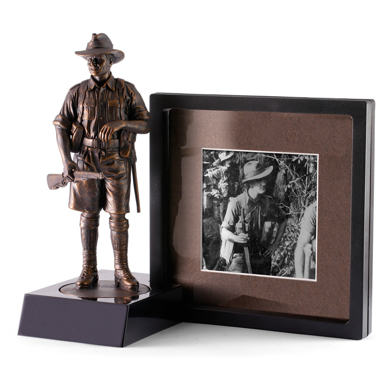 The display stand also accommodates a display frame to showcase photographs, souvenirs or mementos. The frame's contents are suspended between two flexible silicone membranes and appear to be 'levitating' in the frame. Hinges allow easy access to items when they need to be removed from the frame. www.moralepatches.com.au