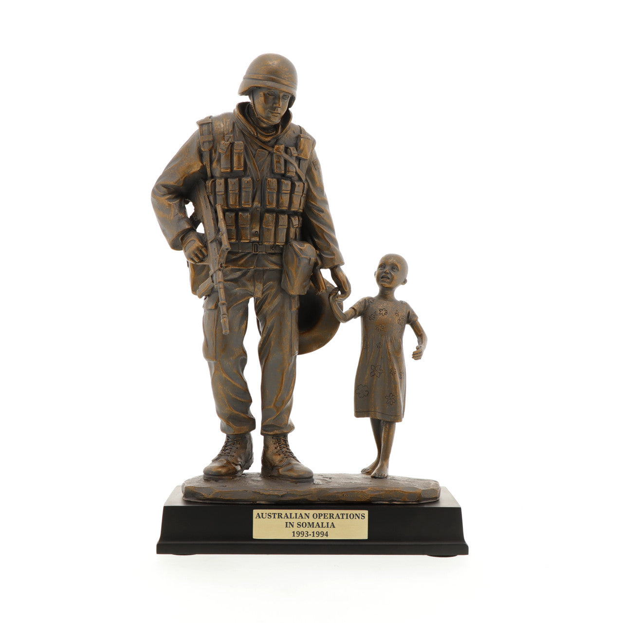 The Somalia Figurine is a sensational keepsake that pays tribute to the brave men and women who served our nation in Somalia. Inspired by Gary Ramage's iconic photograph, this figurine depicts a soldier helping a young girl, symbolizing the spirit of service and humanity. Standing at 30cm tall, this superb figurine is the perfect gift or collectable. www.moralepatches.com.au