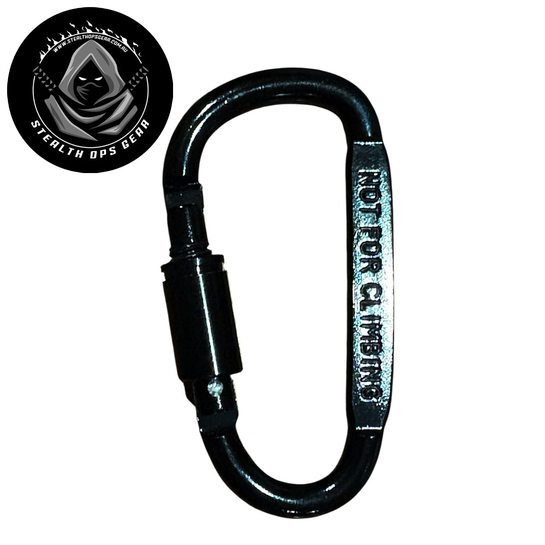 The Stealth Ops Gear 8x4cm Aluminium Carabiner is ideal for attaching backpacks, key chains, water bottles, and various camping gear. Built to support heavy loads up to 50kg, it provides dependable strength for your outdoor adventures, though it is not designed for climbing use. www.moralepatches.com.au
