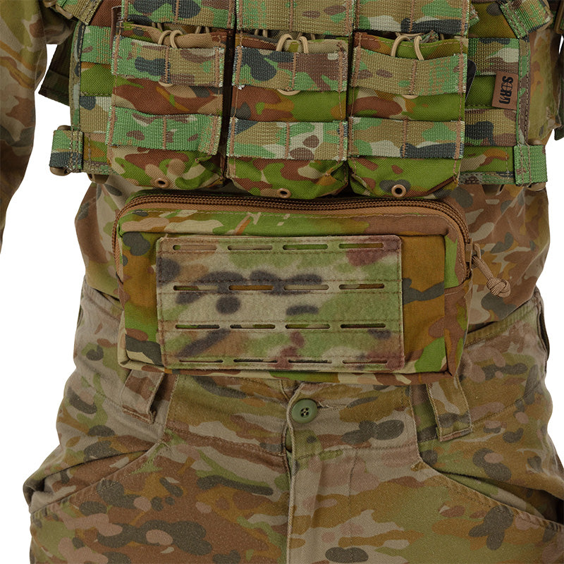This versatile Tactical Vest Hanging Pouch AMCU serves multiple purposes - from carrying medical supplies, navigation essentials, to stowing general gear. Despite its compact size, it offers ample storage space. It can easily be attached to your vest or chest carrier thanks to its universal sandwich Hook & Loop attachment. www.moralepatches.com.au