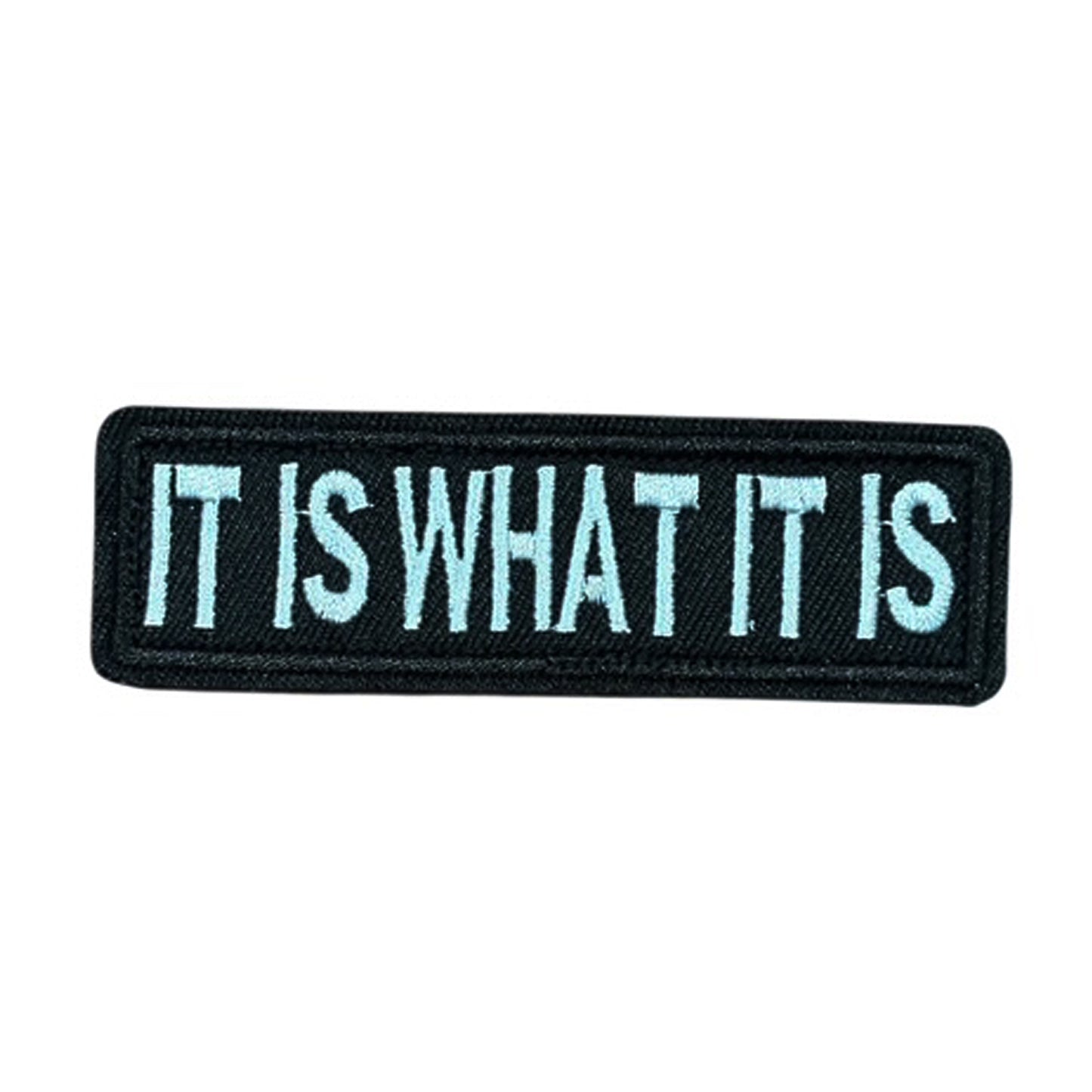 Unleash your creativity with the It Is What It Is Embroidery Patch Velcro Backed! Measuring 9x2.6cm and featuring a beautifully embroidered design and secure hook & loop backing, this patch is a must-have for any collector. www.moralepatches.com.au