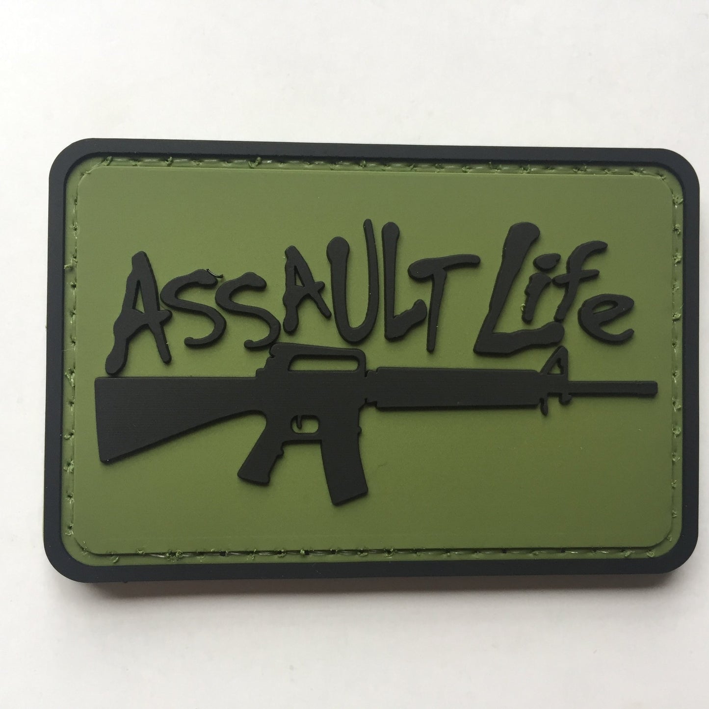 Assault Life PVC Patch, Velcro backed Badge. Great for attaching to your field gear, jackets, shirts, pants, jeans, hats or even create your own patch board. Size: 7.5x5cm