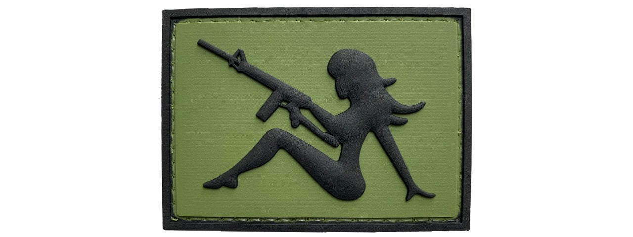 Mudflap Girl with Rifle on Right Hand PVC Patch, Velcro backed Badge. Great for attaching to your field gear, jackets, shirts, pants, jeans, hats or even create your own patch board. Size: 7x5cm