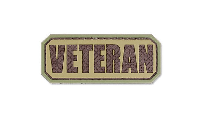 Veteran Tab PVC Patch, Velcro backed Badge. Great for attaching to your field gear, jackets, shirts, pants, jeans, hats or even create your own patch board. Size: 6.3x2.5cm