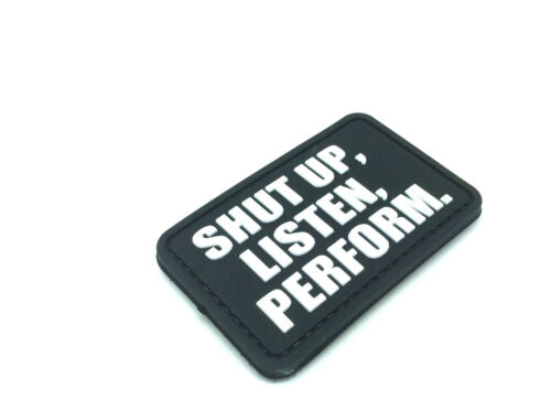 Shut Up Listen Perform PVC Patch, Velcro backed Badge. Great for attaching to your field gear, jackets, shirts, pants, jeans, hats or even create your own patch board. Size: 7x4.5cm