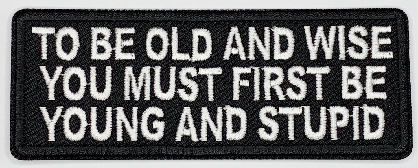 To be old and wise, you must first be young and stupid Iron On Patch. Great for attaching to your jackets, shirts, pants, jeans, hats. Size: 10.4X4cm