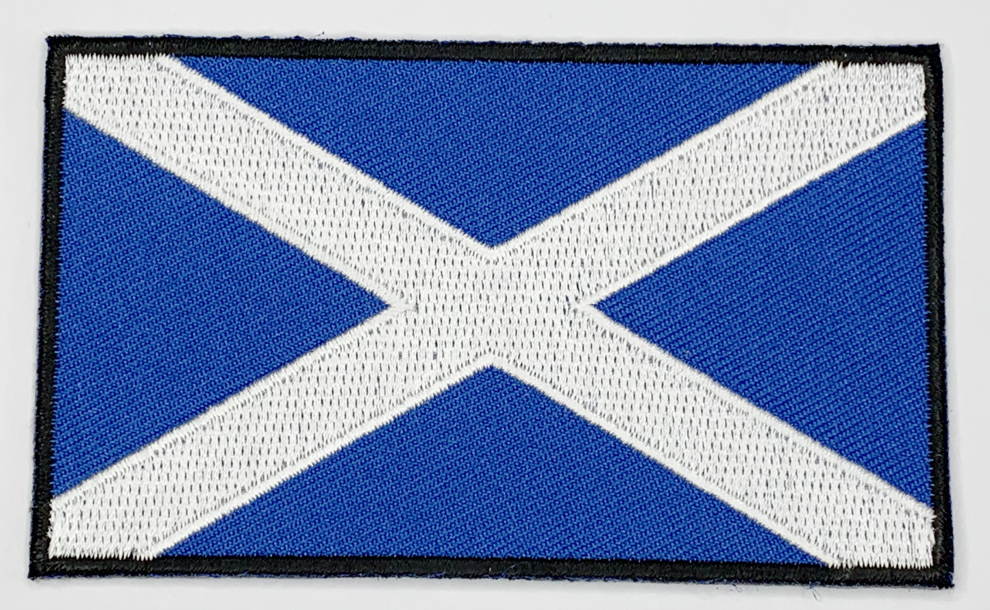 Scotland Flag Iron On Patch. Great for attaching to your jackets, shirts, pants, jeans, hats. Size: 8.89x5.33cm