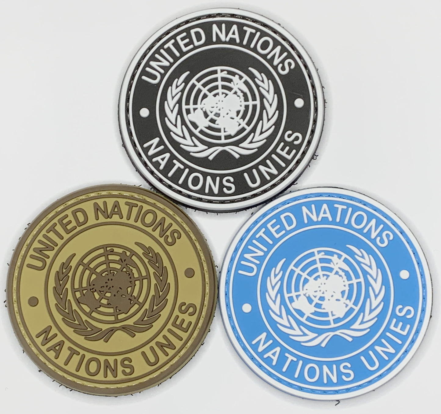6cm PVC United Nations Flag Patch Round Tactical Velcro backed armband army combat badge in multiple colours. Great for attaching to your field gear, jackets, shirts, pants, jeans, hats or even create your own patch board.