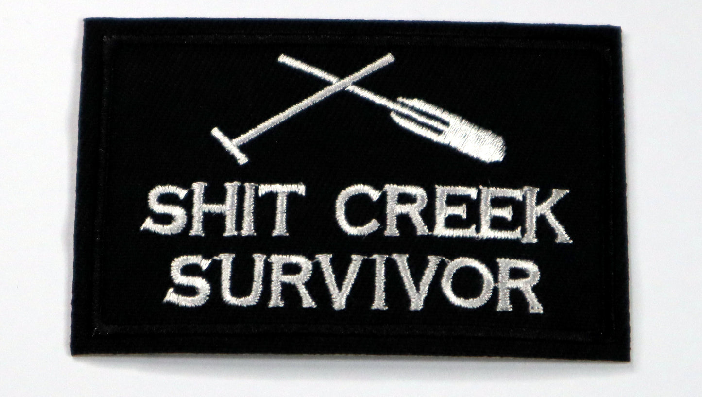 Shit Creek Survivor Iron On Patch. Great for attaching to your jackets, shirts, pants, jeans, hats. Size: 7.8x5cm