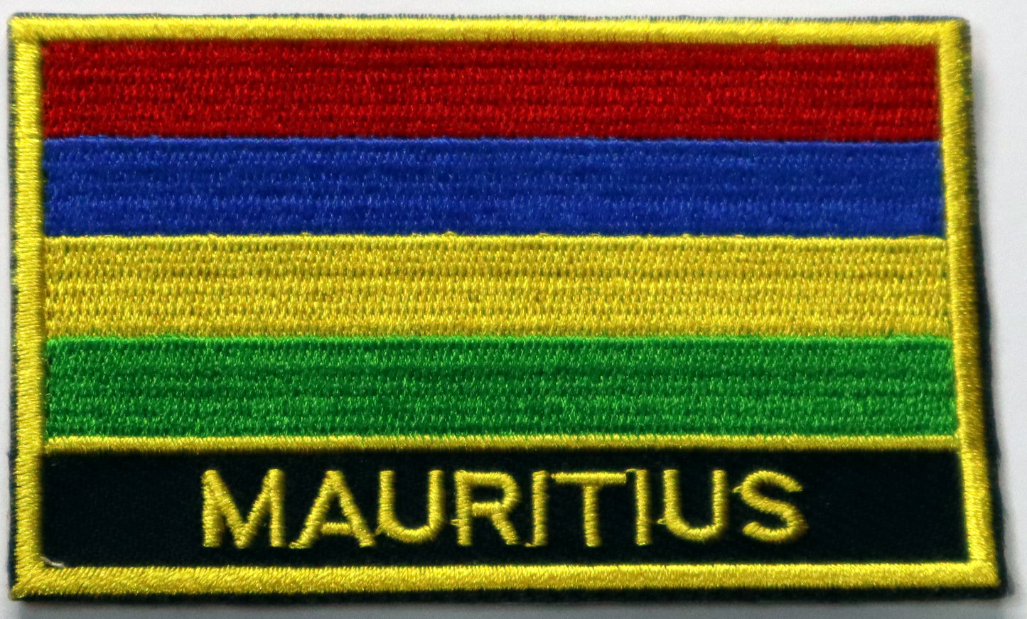Mauritius Flag Iron On Patch. Great for attaching to your jackets, shirts, pants, jeans, hats. Size: 8x5cm