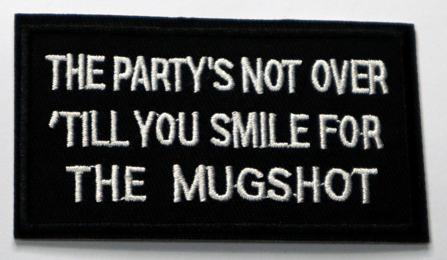The party's not over until you smile for the mugshot Iron On Patch. Great for attaching to your jackets, shirts, pants, jeans, hats. Size: 9.2x5.3cm