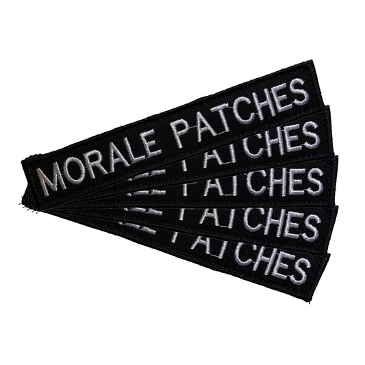 Name tag in black material, size is 2.5cm x 15cm, lettering is 1.5cm in height.  All embroidery is done in upper case letters only as a FYI.  These are great for cadets, police and other public service departments.  Don't forget you can even add the velcro backing and use them on your field gear or even dog vests.  Made on the Gold Coast, please support Australian made www.moralepatches.com.au