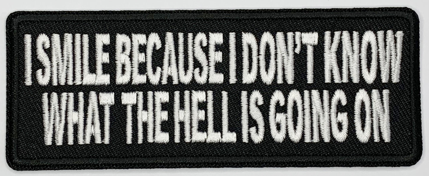 I smile because I don't know what the hell is going on Iron On Patch. Great for attaching to your jackets, shirts, pants, jeans, hats. Size: 10.3x4cm