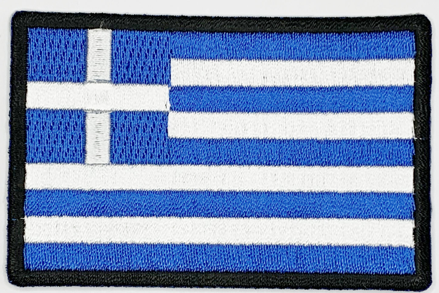 Greek Flag Iron On Patch. Great for attaching to your jackets, shirts, pants, jeans, hats. Size: 7.62x5.08cm