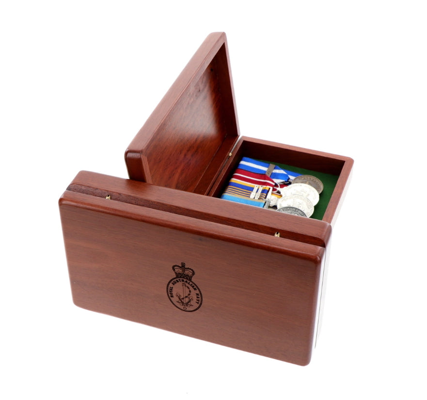 Beautiful Jarrah medal box with room for up to 10 court mounted medals. Laser engraved on the lid with the Navy Crest This box is perfect for keeping those family medals or other heirlooms safe and sound when not on parade.