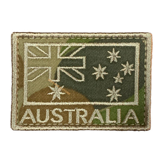 Add a touch of charm to your attire with this Subdued Embroidery Velcro Backed Patch Auscam, featuring the iconic Australian National Flag. Measuring 5cm X 7cm, it is the perfect addition to your jacket, pack or cap. Show your love for your country in a stylish and patriotic way! www.moralepatches.com.au