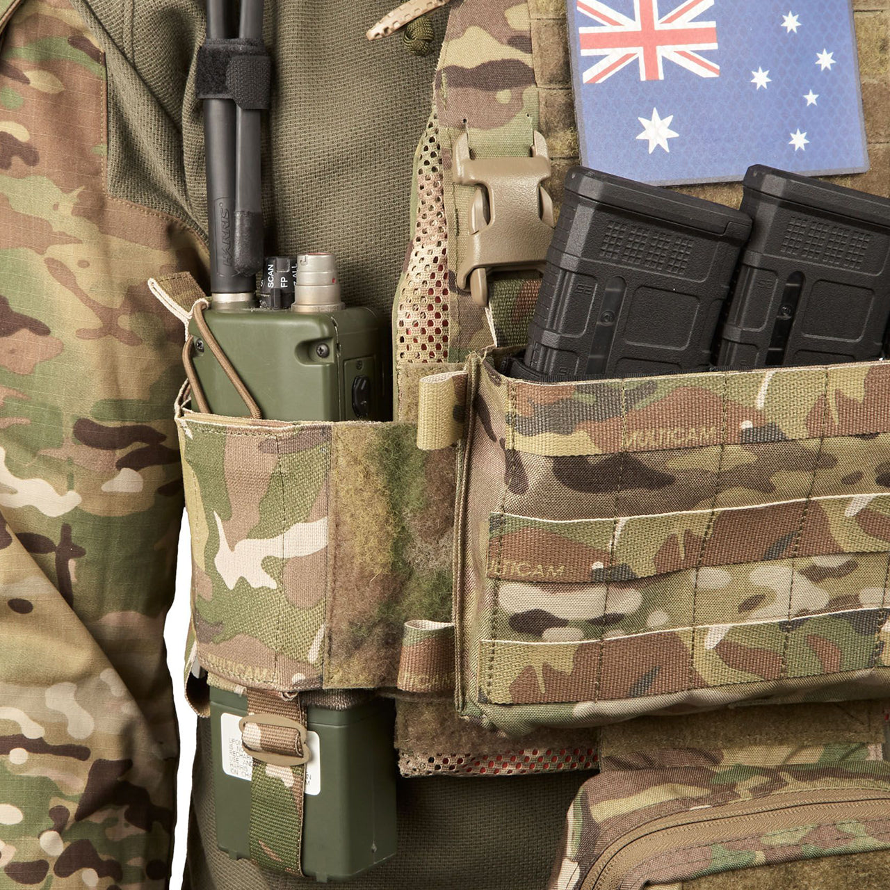 The ASAD Elastic Side Wings are designed to attach to the front or back Velcro area of your plate carrier under your cummerbund to boost carrying capacity without adding weight, they will accept various radios, up to two M4 magazines, a smoke grenade, medical items or similar sized objects. www.moralepatches.com.au holding 152 radio