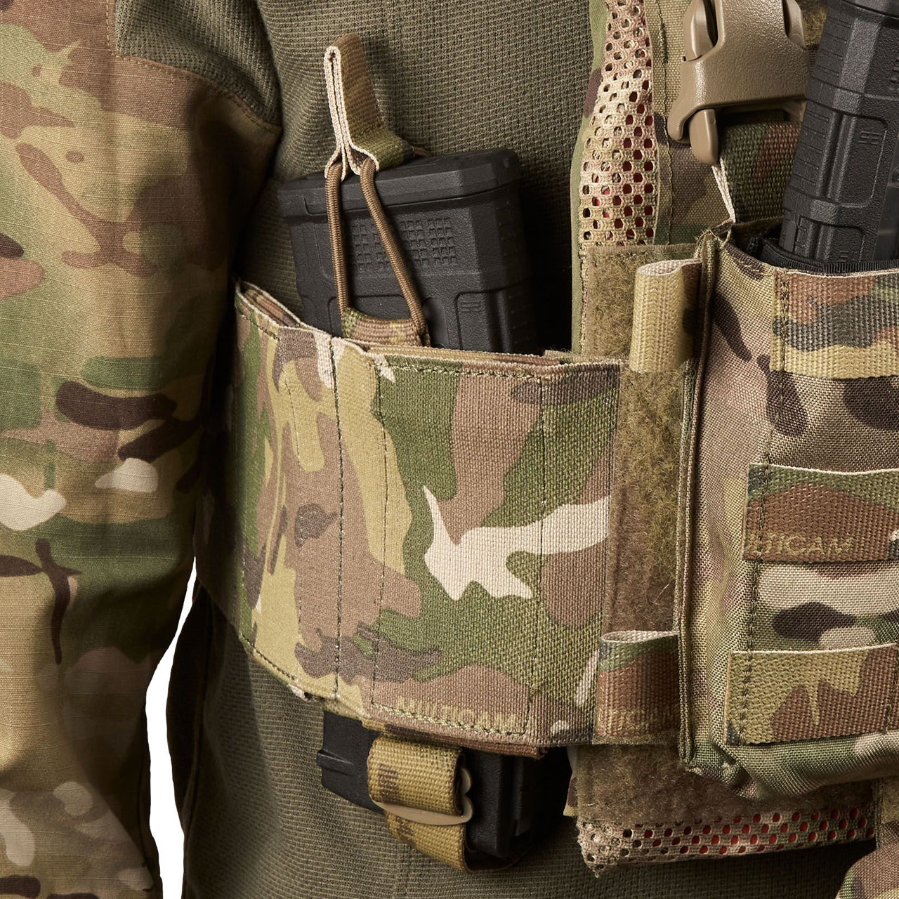 The ASAD Elastic Side Wings are designed to attach to the front or back Velcro area of your plate carrier under your cummerbund to boost carrying capacity without adding weight, they will accept various radios, up to two M4 magazines, a smoke grenade, medical items or similar sized objects. www.moralepatches.com.au wing holding styer magazine