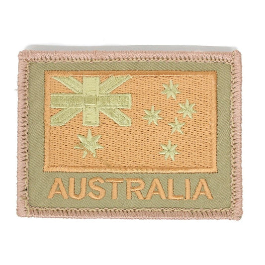 The Australia Flag Tan On Khaki Embroidery Velcro Backed Patch features our embroidery style Australian National flag on a stylish khaki background, complete with the inspiring word "AUSTRALIA" underneath. Measuring 75 x 55mm, this patch is the perfect way to show your love for Australia in a subtle yet powerful way. www.moralepatches.com.au