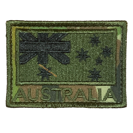 Add a touch of charm to your attire with this Green Embroidery Velcro Backed Patch Auscam, featuring the iconic Australian National Flag. Measuring 5cm X 7cm, it is the perfect addition to your jacket, pack or cap. Show your love for your country in a stylish and patriotic way! www.moralepatches.com.au