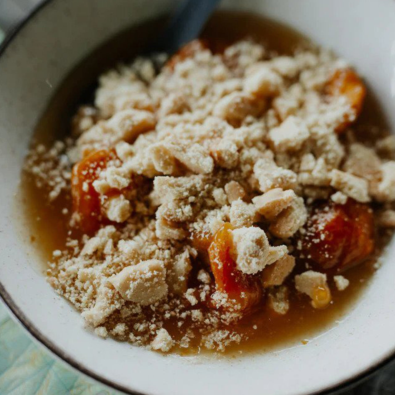 Freeze dried apricot halves in a sweet sauce topped with shortbread biscuits www.moralepatches.com.au