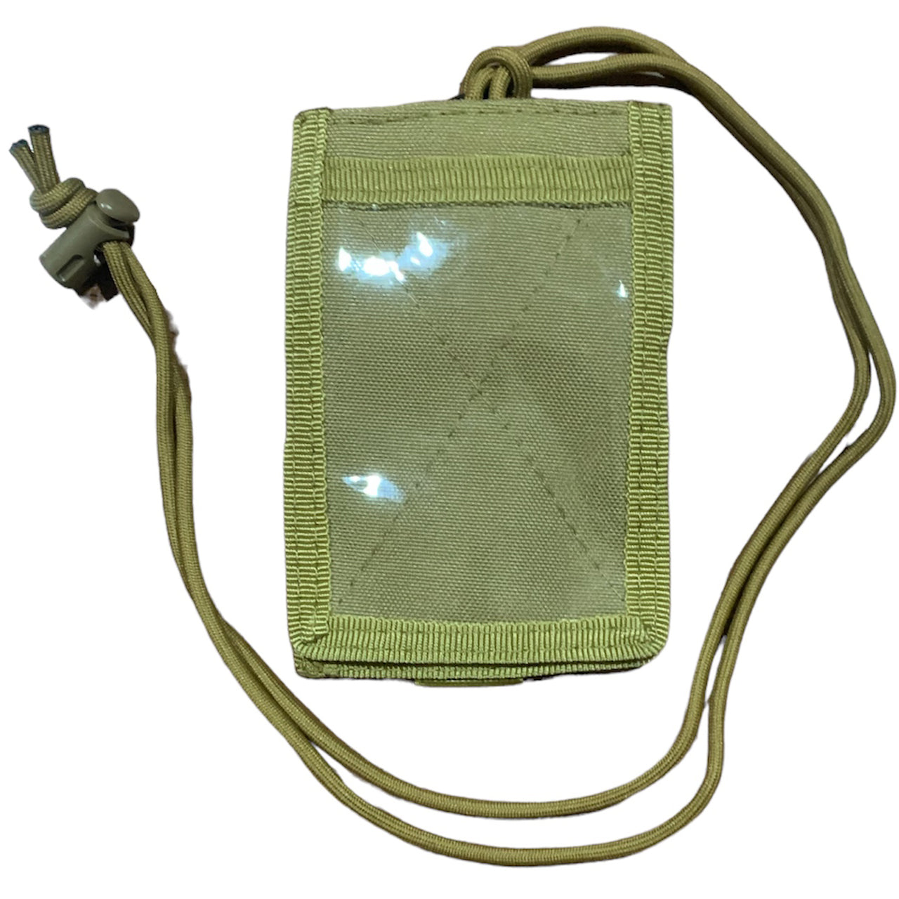 Elevate your tactical gear with the Elite Tactical MOLLE Capable ID Holder in Coyote. Its convenient front ID window and MOLLE compatibility make it the perfect accessory for attaching to your equipment or wearing around your neck. With space for a pen and three separate card slots in the back, this holder offers added security for your valuables. The tear away front ID holder and included paracord with toggle add a rugged and functional touch. www.moralepatches.com.au
