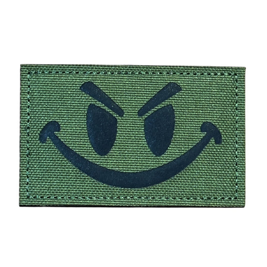Make a bold statement with the Evil Smile Laser Cut Tan Patch. This striking 8x5cm patch features laser-cut precision detailing that demands attention. Backed with both hook and loop fasteners, it's ready to attach to tactical gear, backpacks, or uniforms instantly. www.moralepatches.com.au