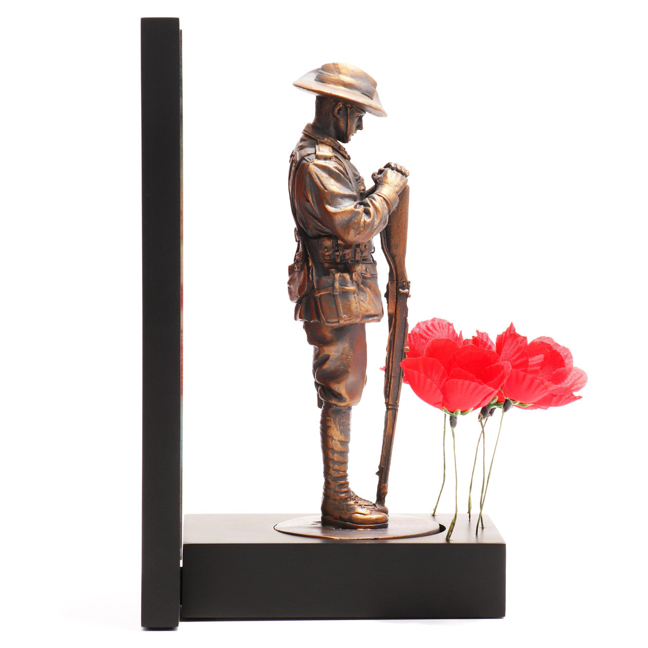 This beautifully crafted miniature figurine is a poignant tribute to our fallen soldiers. It comes with a striking acrylic backdrop, featuring an intricate stained-glass poppy design that adds depth and significance to the piece. www.moralepatches.com.au