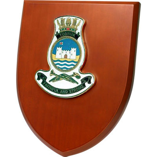 The Exceptional HMAS Tobruk Plaque is now available for order. This exquisite plaque showcases a stunning 100mm full colour enamel crest, elegantly placed on a 200x160mm timber finish shield.  www.moralepatches.com.au