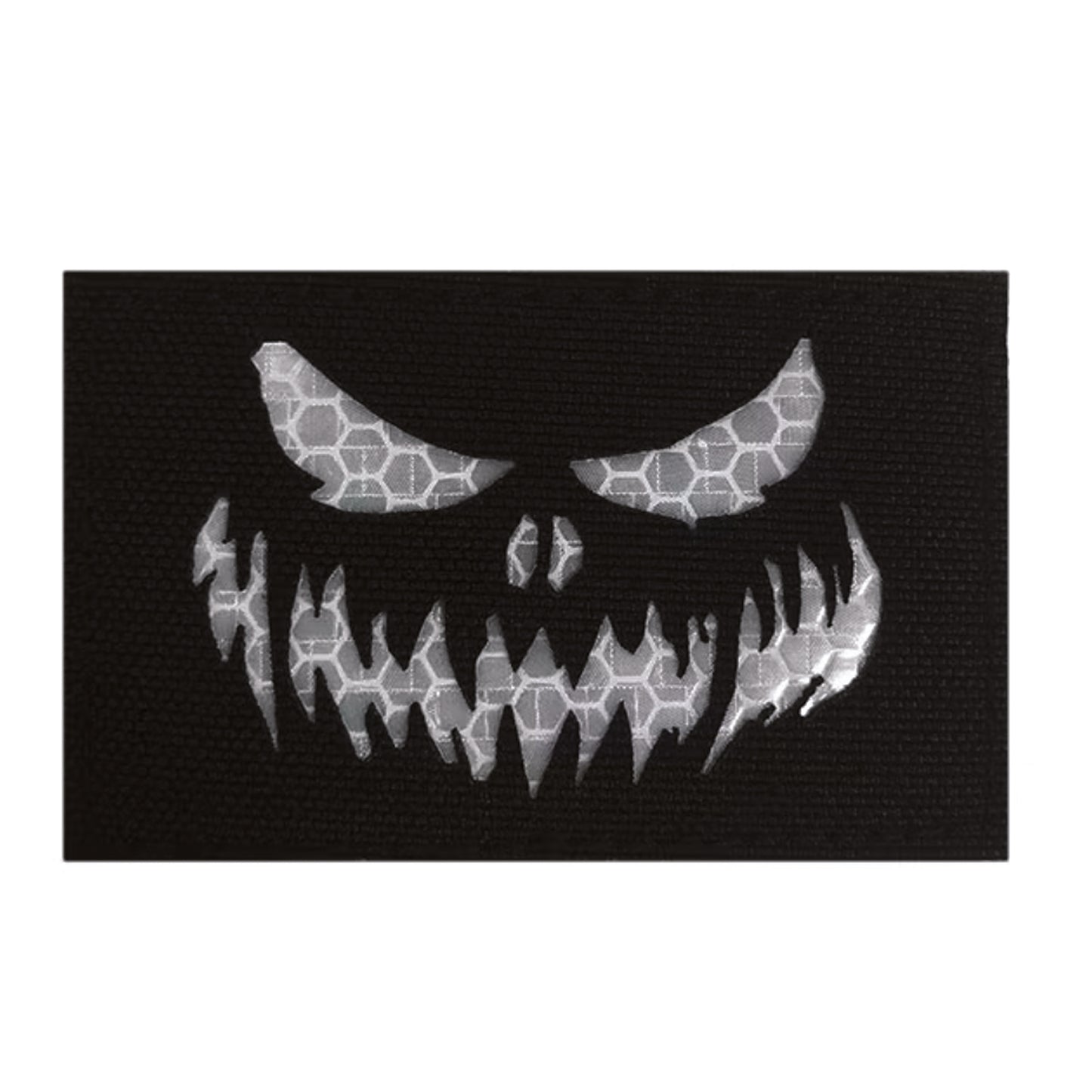 Stand out in low-light conditions with this striking Haunting Laser Cut Reflective Patch Hook &amp; Loop. Precision laser-cut design delivers crisp, detailed edges that catch the eye, while the reflective feature ensures visibility when it matters most.  www.moralepatches.com.au