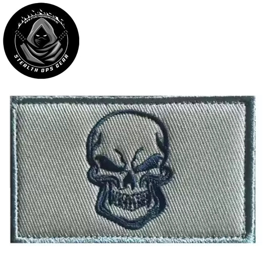 Unleash your creative side with the Evil Skull Black On Coyote Embroidery Patch Hook &amp; Loop. Measuring 8x5cm, this patch features a stunningly embroidered design and a secure hook &amp; loop backing. A must-have for collectors looking for high-quality additions to their collection. www.moralepatches.com.au