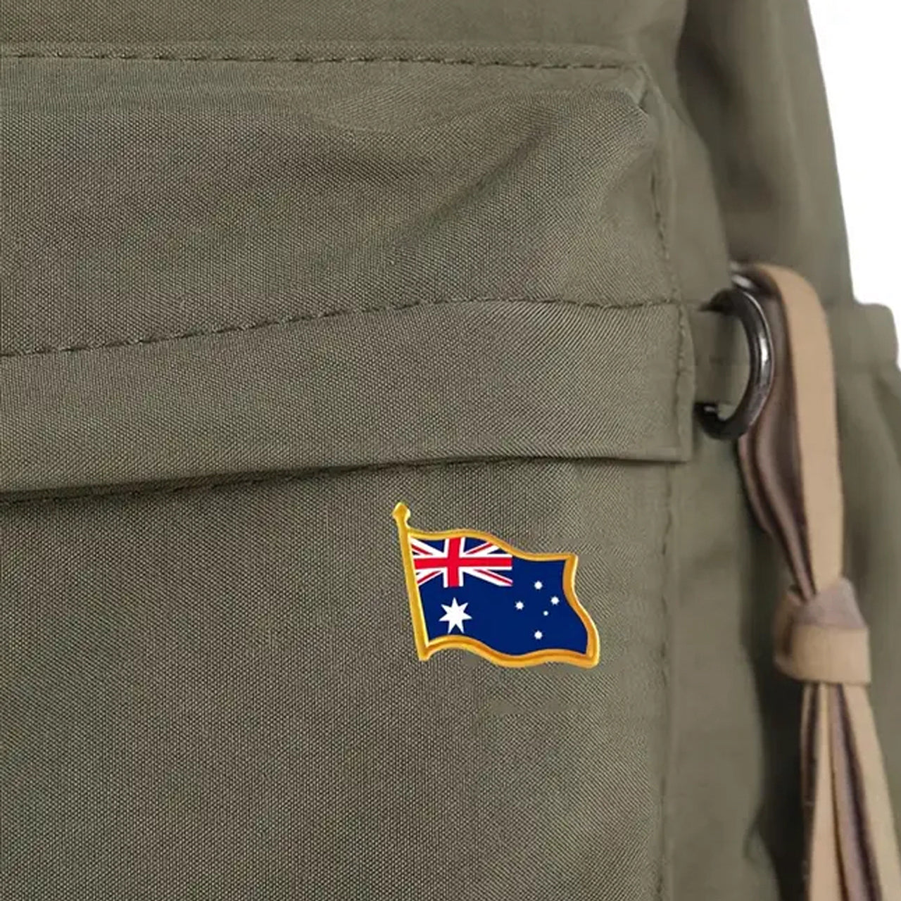 This gold-plated, enamel-filled lapel pin allows you to proudly display the Australian flag while honouring all those who have served or are currently serving in all theatres of war and peacekeeping efforts. Featuring the Australian Flag, it symbolises both national pride and remembrance. www.moralepatches.com.au