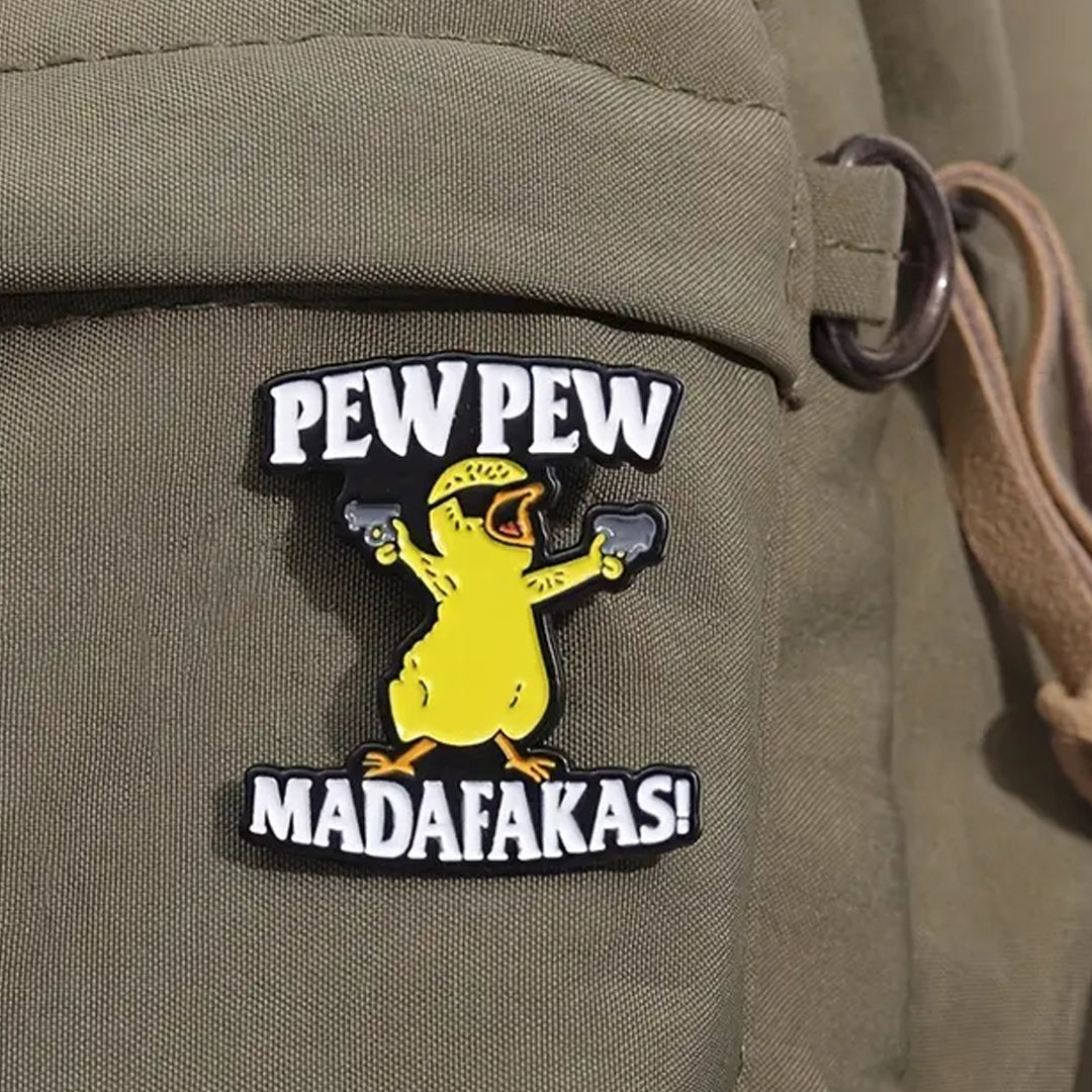 This playful and witty pin is perfect for the friend who shares your sense of humour. Showcasing the clever phrase "Pew Pew Lapel Pin."&nbsp; An ideal gift to brighten someone's day and offer a comforting virtual hug.

Size: 31mm (w) x 35mm (h) www.moralepatches.com.au