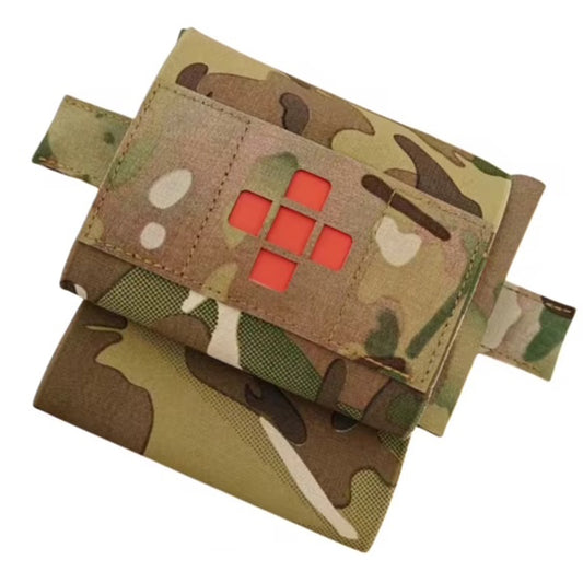 Compact yet comprehensive, this trauma first aid kit pouch combines tactical functionality with practical design. Weighing just 102 grams and measuring 22.5x10cm, it's engineered for rapid response without bulk. www.moralepatches.com.au