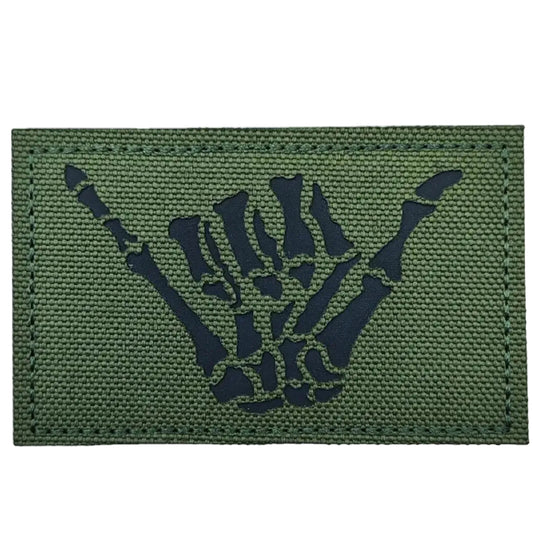 Make a bold statement with the Cool Hand Laser Cut Green Patch. This striking 8x5cm patch features laser-cut precision detailing that demands attention. Backed with both hook and loop fasteners, it's ready to attach to tactical gear, backpacks, or uniforms instantly. www.moralepatches.com.au