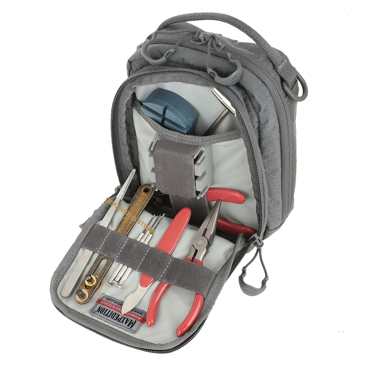 The AUP Accordion Utility Pouch is a small pouch with accordion style dividers. It has a frontal zippered compartment with elastic organization and a top carry handle made from comfortable Shapeshift webbing. www.moralepatches.com.au