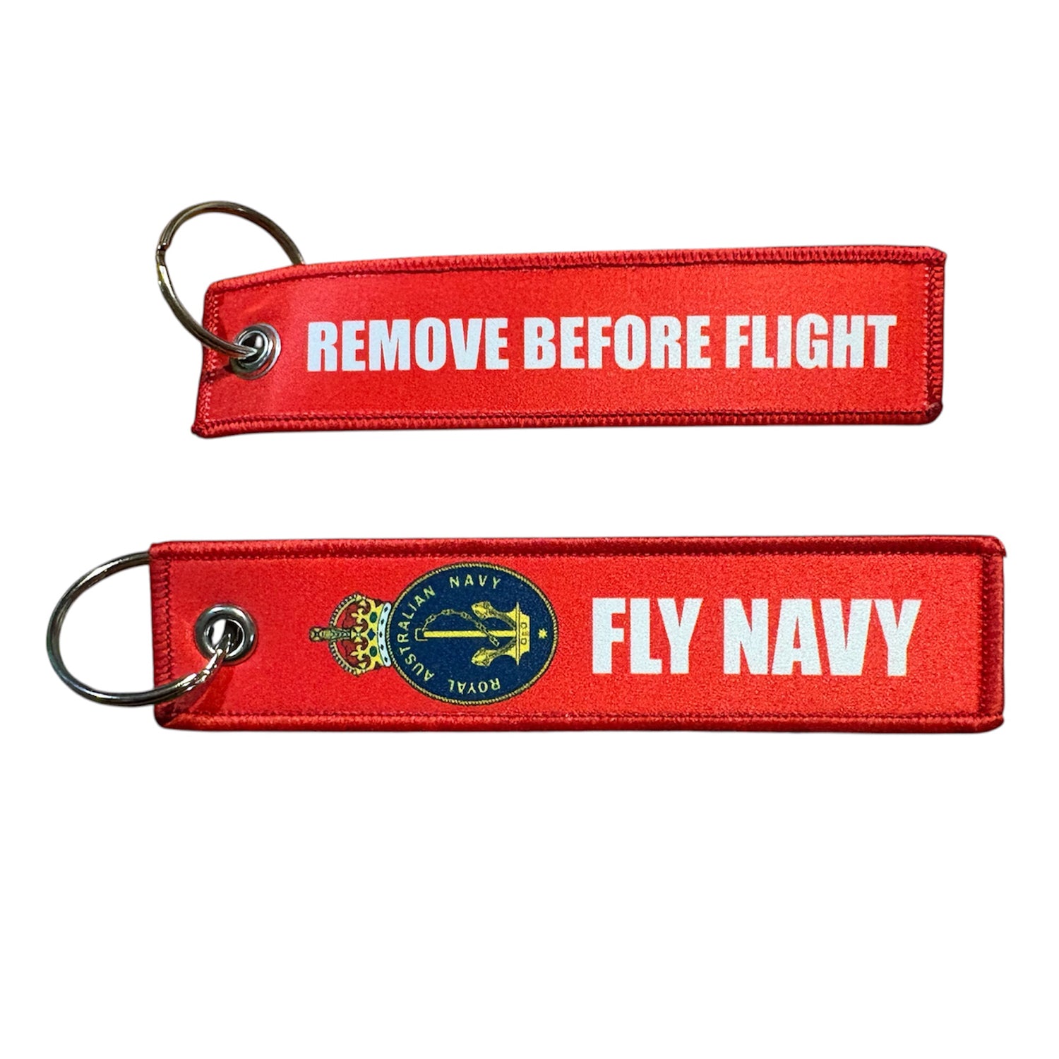Keep your keys secure and add a touch of military pride with this authentic Navy Key Tag. Featuring bold embroidered Navy insignia and the iconic "Remove Before Flight" wording, it's a practical accessory that makes a statement. www.moralepatches.com.au