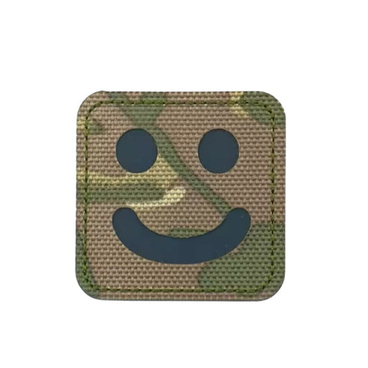 Easily add some personality and style to your gear with our Happy Face Laser Cut Patch Multicam Hook &amp; Loop! Measuring at a perfect 5x5cm size, this patch features a hook and loop backing for easy application. Express yourself and make a statement with this versatile and durable patch. Order now and add some fun to your gear collection! www.moralepatches.com.au