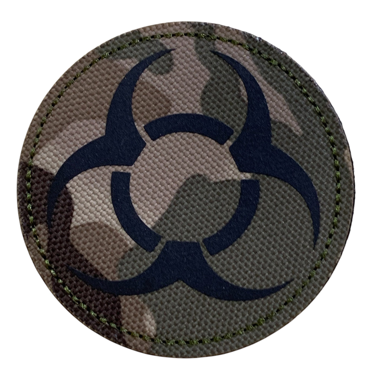 Unleash your passion and make a bold statement with the Biohazard Laser Cut Patch Multicam Hook &amp; Loop. Measuring at 7cm, this patch features a striking design that will surely appeal to the senses. With both hook and loop backing provided, it's easy to add to your gear and make a powerful statement. Order yours now and make a statement that can't be ignored! www.moralepatches.com.au