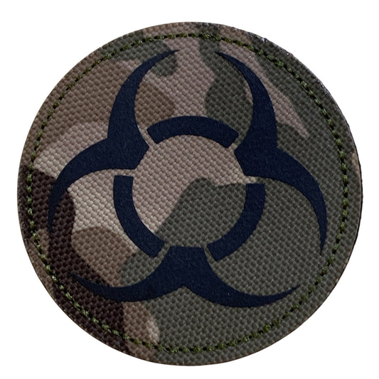 Unleash your passion and make a bold statement with the Biohazard Laser Cut Patch Multicam Hook &amp; Loop. Measuring at 7cm, this patch features a striking design that will surely appeal to the senses. With both hook and loop backing provided, it's easy to add to your gear and make a powerful statement. Order yours now and make a statement that can't be ignored! www.moralepatches.com.au