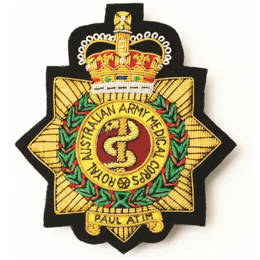 Fashion your look with a stunning Royal Australian Army Medical Corps (RAAMC) Bullion Pocket Badge! Perfect for a blazer, bag, or anywhere you want to make a stylish statement. Size: approximately 80 x 80mm. Closes securely with three butterfly catches at the back. www.moralepatches.com.au