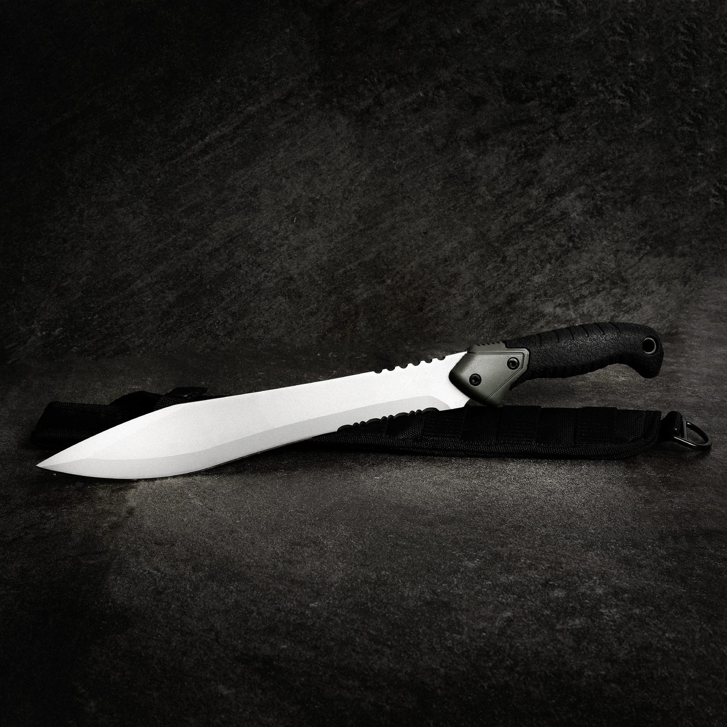 The Reapr TAC Jungle Knife is a cool 17 inches of sharp steel that doubles as an all-round camping machete and survival knife in one. With an ultra-sharp modified drop point blade designed for versatility, and a partially serrated blade, most any challenge that comes your way can be handled with ease. www.moralepatches.com.au