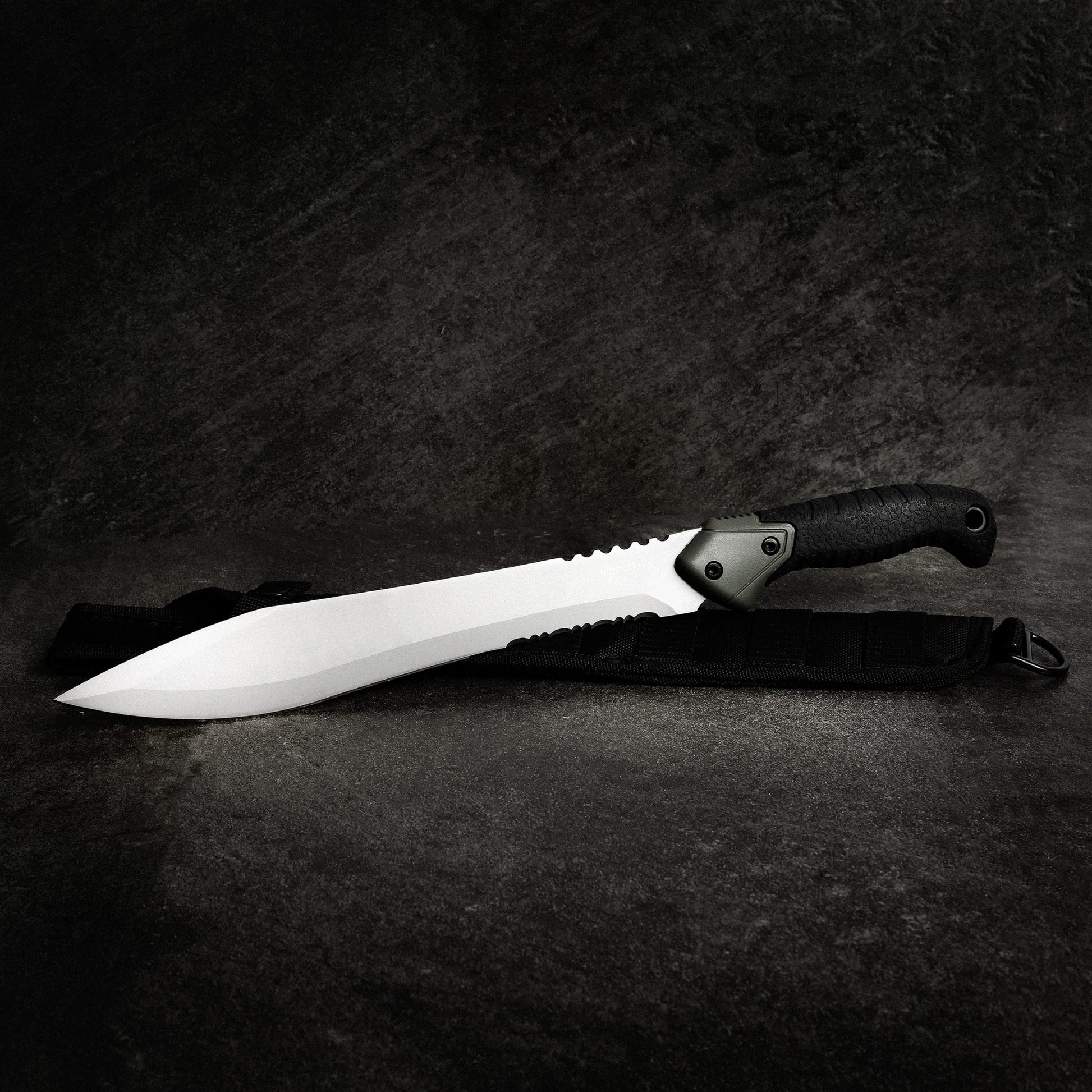 The Reapr TAC Jungle Knife is a cool 17 inches of sharp steel that doubles as an all-round camping machete and survival knife in one. With an ultra-sharp modified drop point blade designed for versatility, and a partially serrated blade, most any challenge that comes your way can be handled with ease. www.moralepatches.com.au