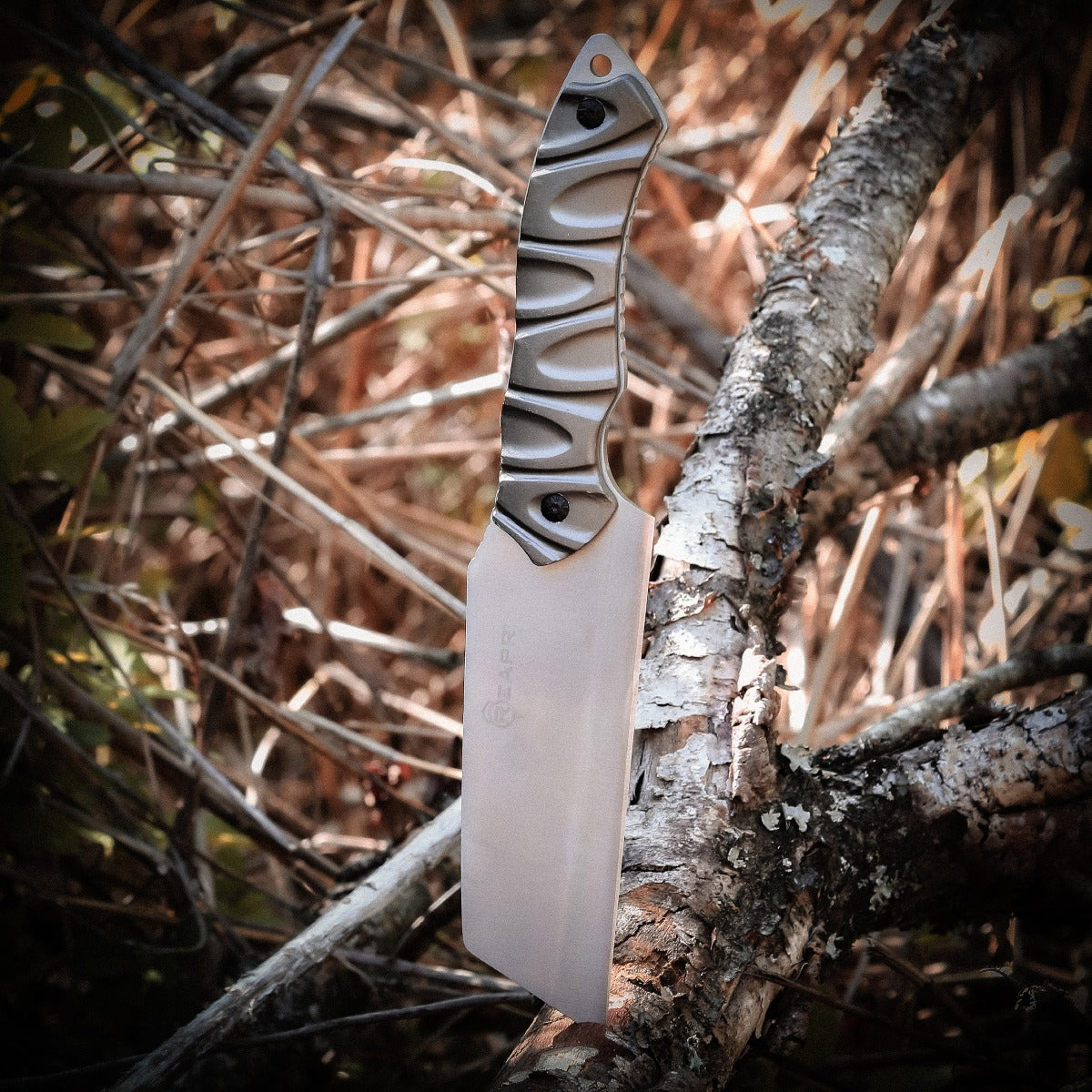 The Reapr JAMR Knife is the ultimate in versatile, tactical fixed-blade knives. The JAMR features an industry first modified cleaver blade, combining the functions of a cleaver, drop point knife and reverse tanto blade to meet a variety of demands, whether as a hunting knife, camping knife, and for guiding, tactical and survival use. www.moralepatches.com.au