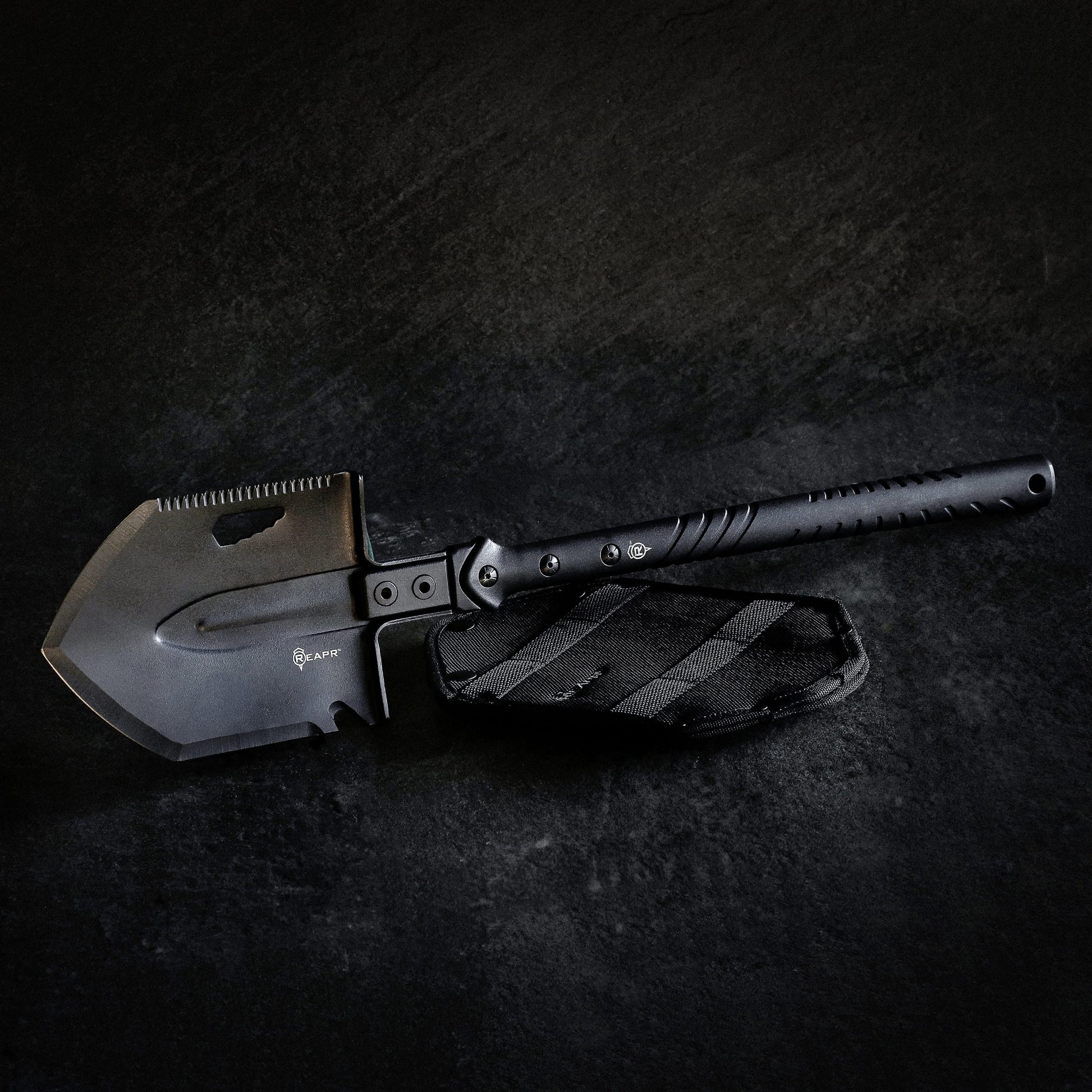 The REAPR 11021 TAC Survival Shovel is the ultimate survival tool shovel. This compact, space saving tool, features a 7 1/2″ stainless steel precision cast head (with a powder coat wrinkle finish) combining a saw edge, ripper, chopping edge and wrenches. www.moralepatches.com.au