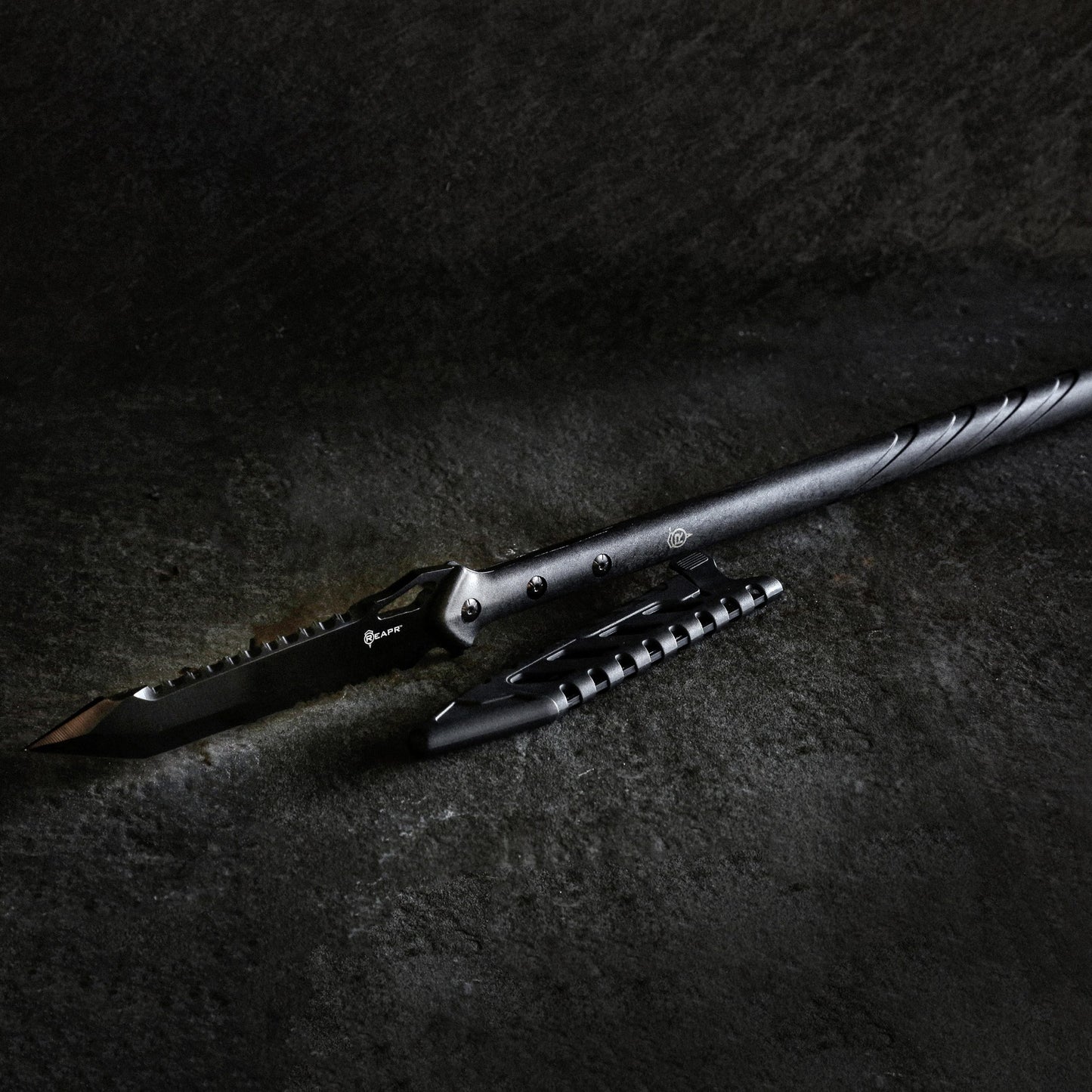 The outstanding REAPR 11022 TAC Javelin Serrated Spear cuts, chops, saws, and thrusts efficiently and effectively, giving you a javelin spear that functions equally as well as a utility tool. www.moralepatches.com.au
