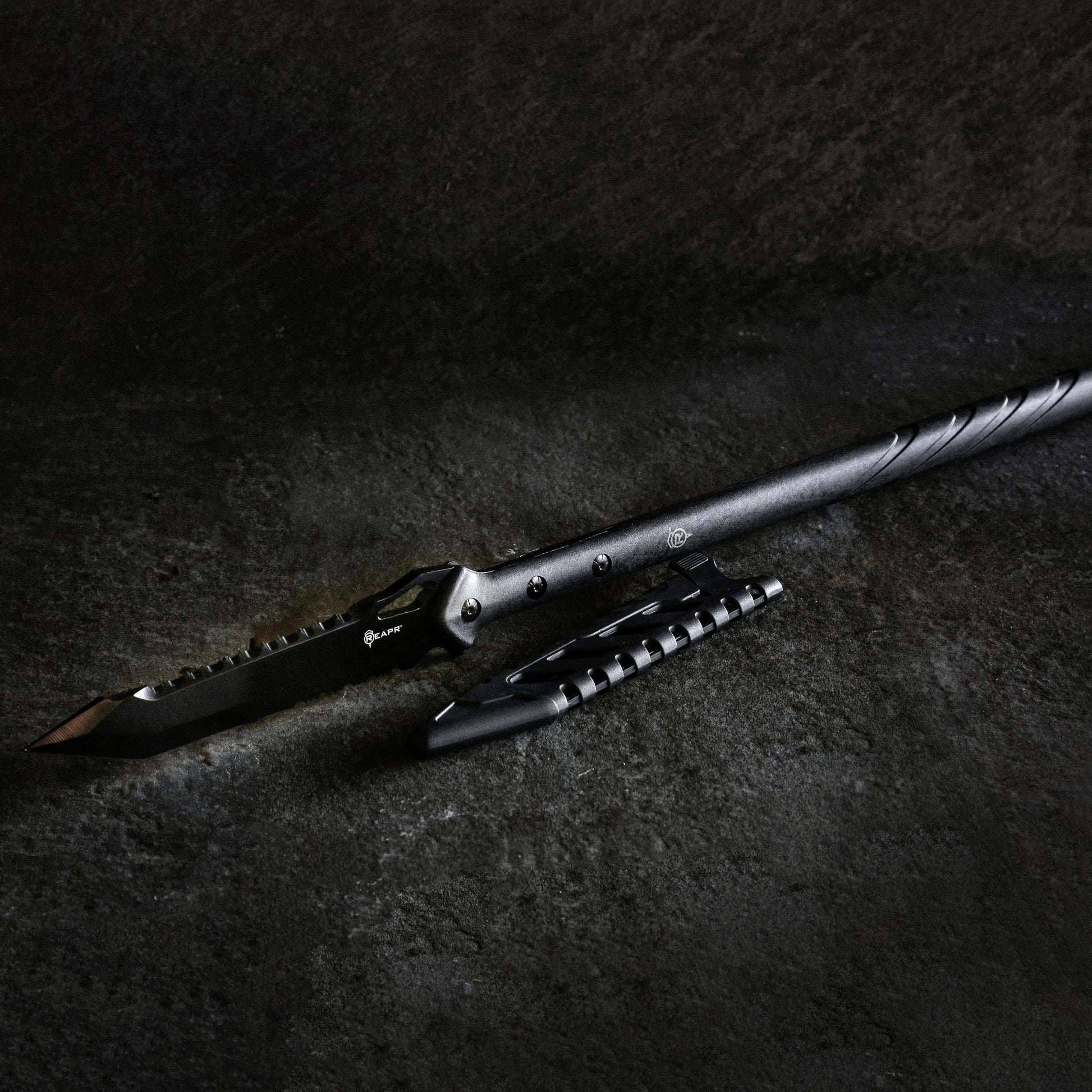 The outstanding REAPR 11022 TAC Javelin Serrated Spear cuts, chops, saws, and thrusts efficiently and effectively, giving you a javelin spear that functions equally as well as a utility tool. www.moralepatches.com.au