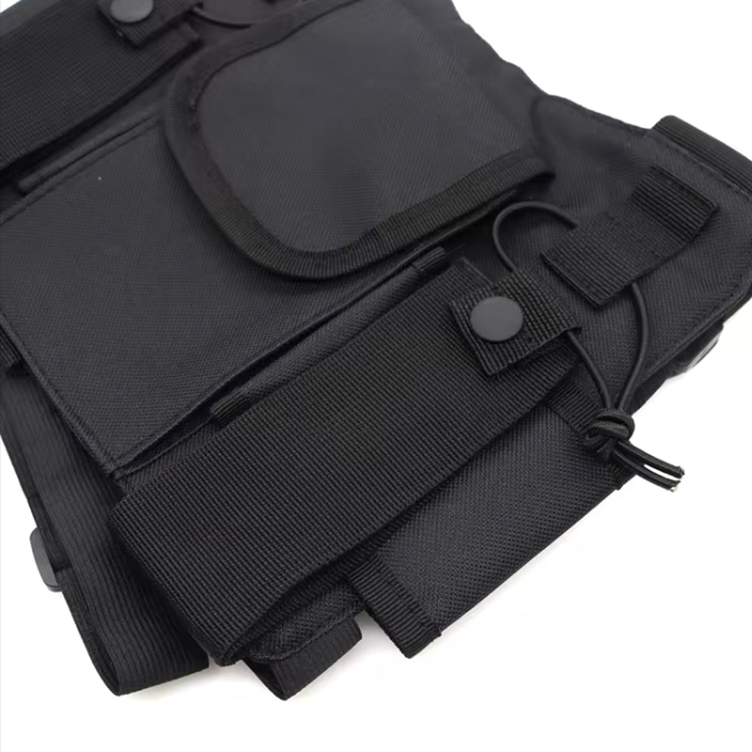 The Radio Vest Black is an essential gear piece for professionals who rely on seamless communication. Trusted by police, military, security teams, and hospital staff, this durable vest is designed to keep your radios secure and accessible. It features dedicated compartments to carry two radios simultaneously, ensuring you stay connected at all times. www.moralepatches.com.au