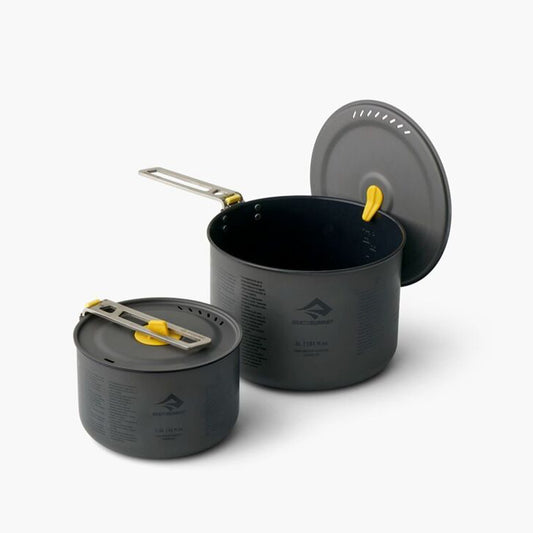 The Frontier Ultralight Two Pot Set includes a compact 1.3L and generously-sized 3L pot made of high quality hard-anodised aluminium alloy for durability and efficient heat transfer. Elevate your cooking experience with a ceramic non-stick coating, clever strainer holes in the pot lid, and a Lid Keep that allows you to clip the lid to the side of the pot to free up a hand for stirring or seasoning. www.moralepatches.com.au